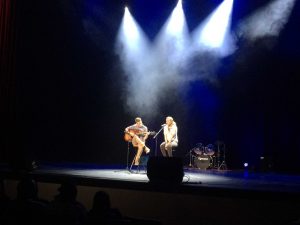 Juniors Cameron Nachreiner and Alyssa Debock perform an acoustic duet on stage (C. Thomas).