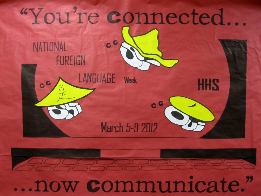Spanish teacher Laura Shallcrosss poster is based on the theme of Youre Connected... Now Communicate! (H. Baldacci).