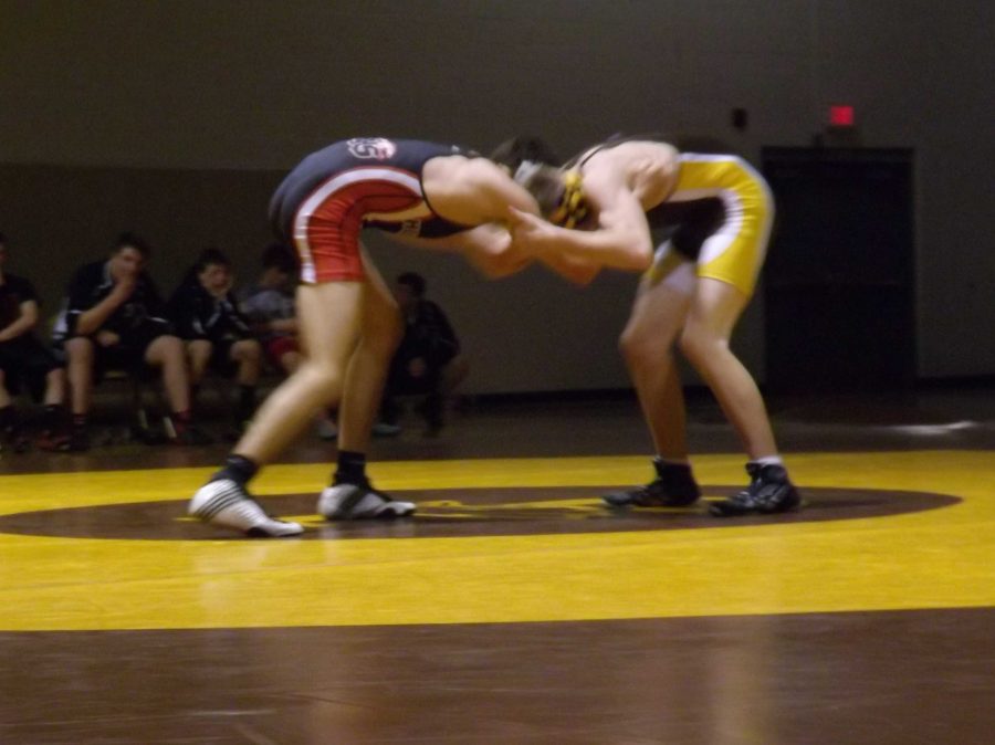 Wrestling pins down Golden Eagles, takes win at Jacobs