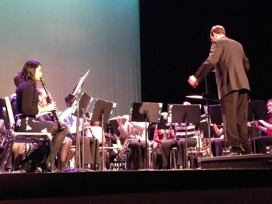 The Wind Ensemble B performs in their holiday concert (M. Wilson). 