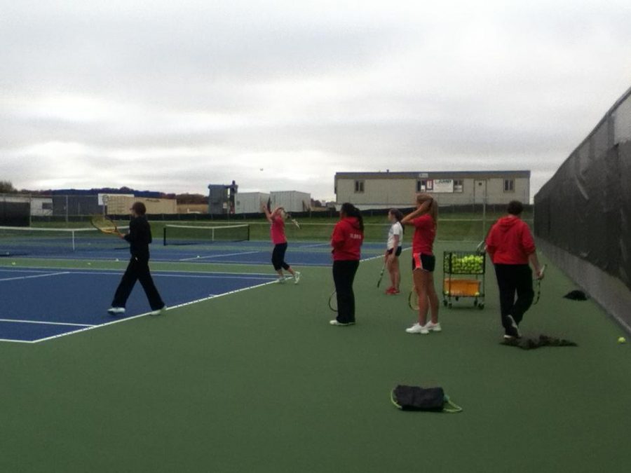 Varsity girls tennis team practices for Conference (M.Iqbal)