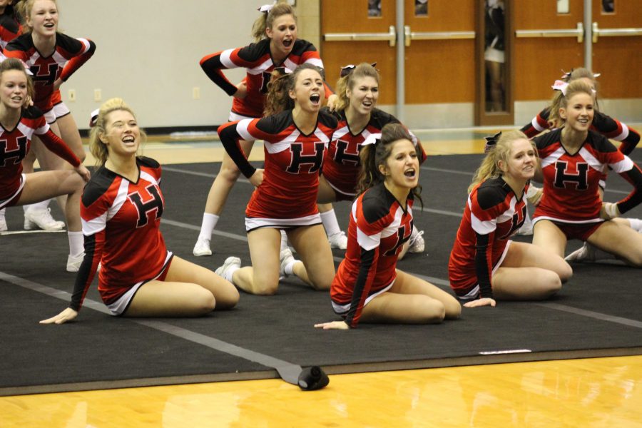 Varsity Cheerleading team takes home the conference title for the third year in a row