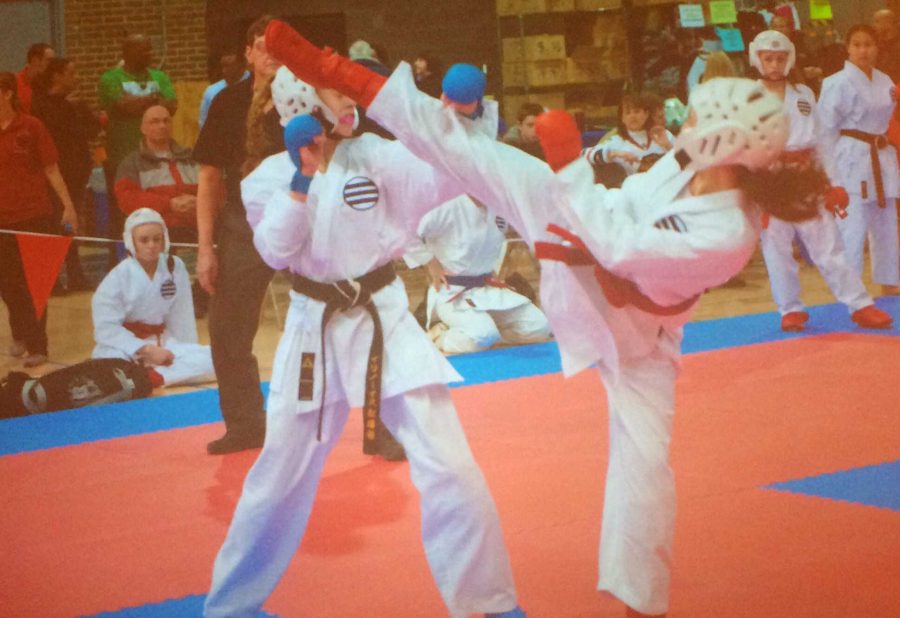 Sophomore Kassidy Mahoney on the right, at the Chicago Classic Karate Tournament in March, 2014. 