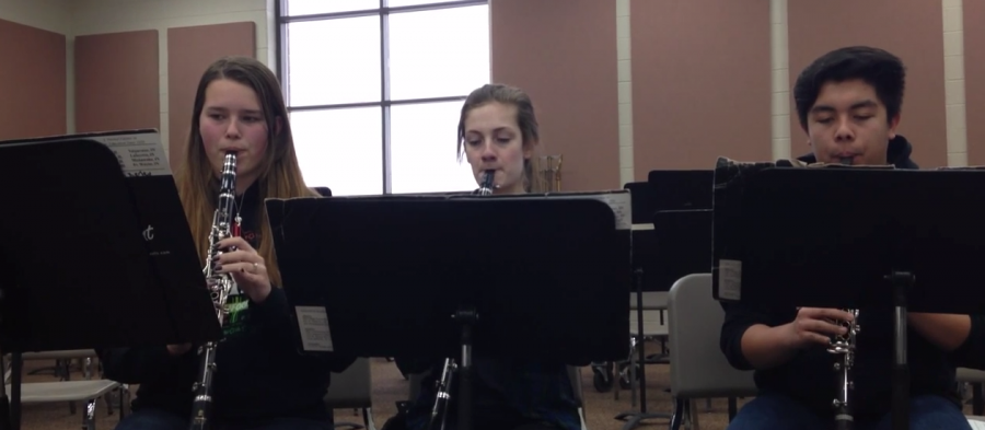 Payton Kerley, Annaliese White, and Matthew Rodriguez perform a trio piece playing their clarinets (P. Patel).