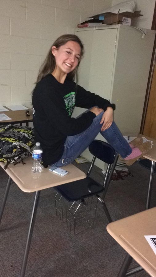 Darby Terry sitting in Mr. Aneys classroom.