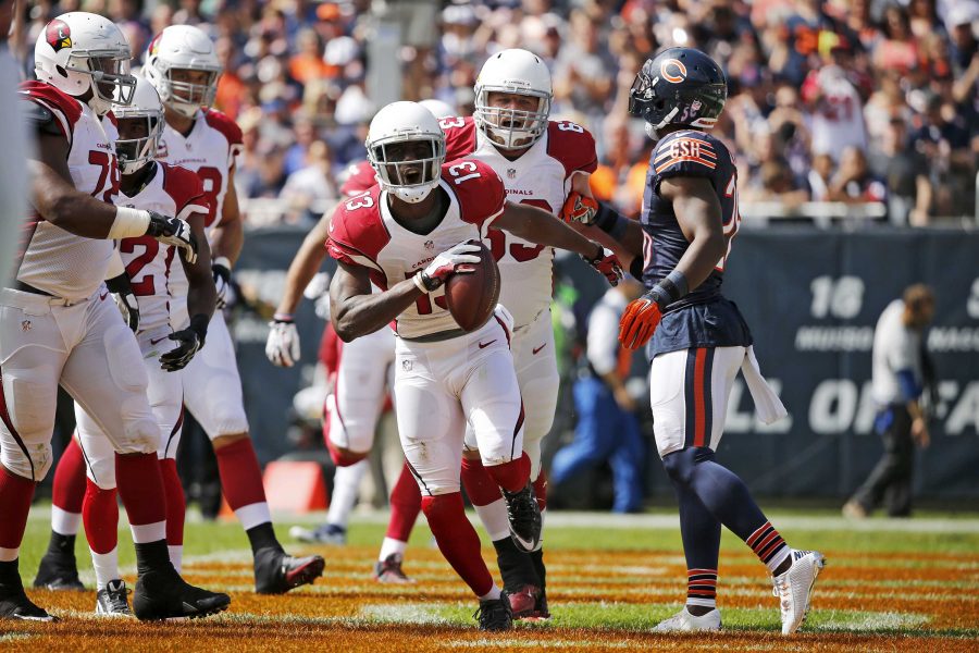 Arizona Cardinals wide receiver Jaron Brown (13) celebrates a touchdown run against the Chicago Bears during the first quarter on Sunday, Sept. 20, 2015, at Soldier Field in Chicago. (Jose M. Osorio/Chicago Tribune/TNS)