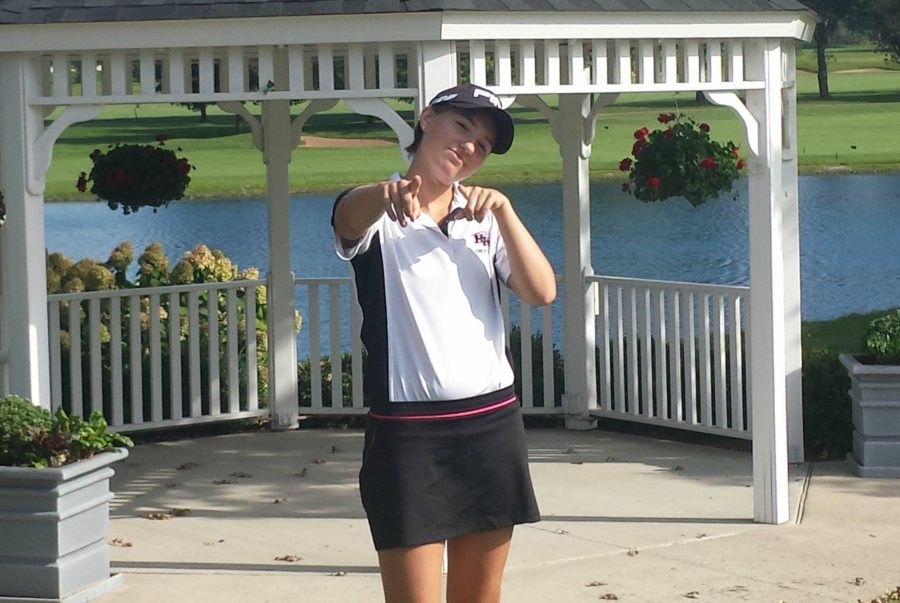 Senior Lexi Lowitzki has some fun before her golf meet. (Danielle King)
