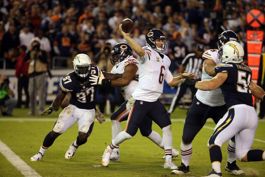 Chicago Bears quarterback Jay Cutler (6) passes as San Diego Chargers outside linebacker Jeremiah Attaochu (97) rushes during the third quarter on Monday, Nov. 9, 2015, at Qualcomm Stadium in San Diego. (Brian Cassella/Chicago Tribune/TNS)