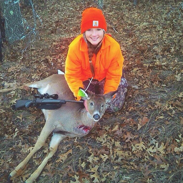 Bryzcek positioned with her doe and gun. (Courtesy of G. Bryczek)