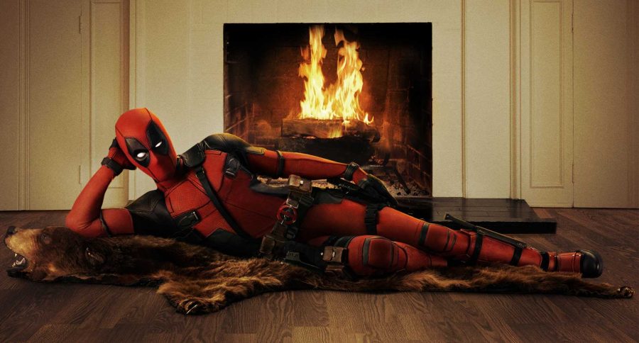 Deadpool lounging by the fire (Courtesy of fox-movies.com).