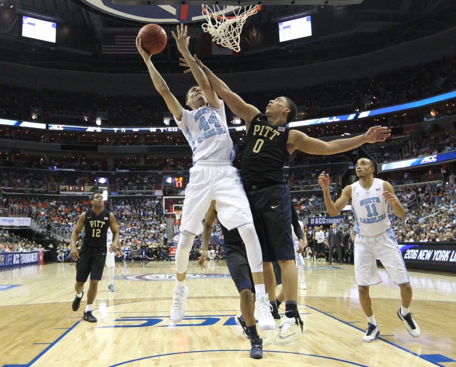 North Carolina's Justin Jackson (44) shoots as Pittsburgh's James Robinson (0) defends during the second half of the quarterfinals of the 2016 New York Life ACC Tournament on Thursday, March 10, 2016, at the Verizon Center in Washington, D.C. (Ethan Hyman/Raleigh News &amp; Observer/TNS)