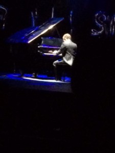 Contestant Joey White plays a song on the piano for the talent portion (S. Biernat).