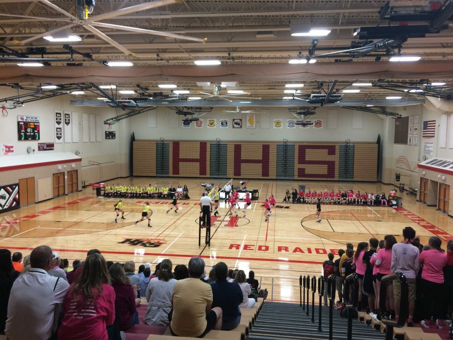 The Huntley red raiders playing volleyball against Crystal Lake South (C. Thomas).