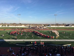 Huntley and Loyola shake hands after Huntley is defeated 24-0. Photo courtesy of Maggie McGee