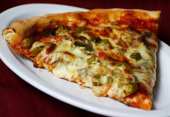 A slice of pizza from Taylor Street, located on Algonquin Rd. (Courtesy of taylorstpizza.com).