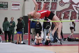 Senior Mckenzie Krich clearing 4 feet 8 inches in high jumping. 