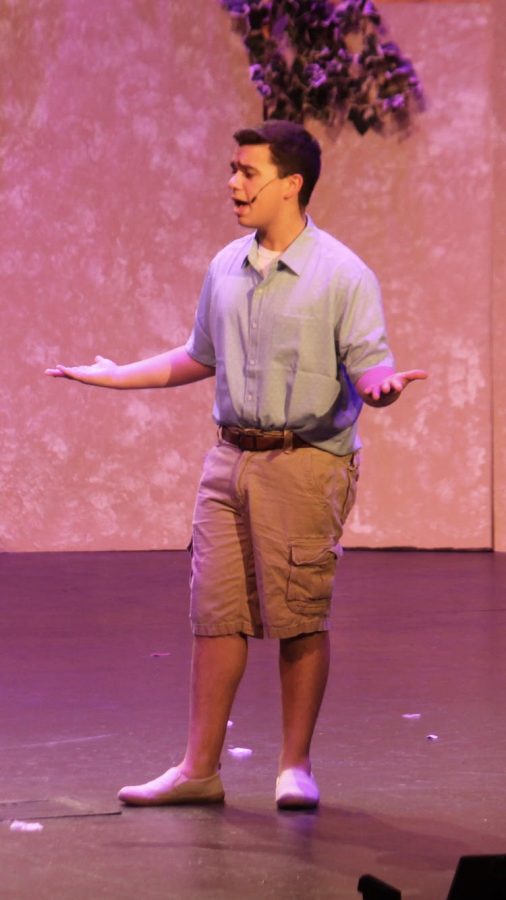 Moore performing as Sam Carmichael in Huntley High Schools production of  Mamma Mia.