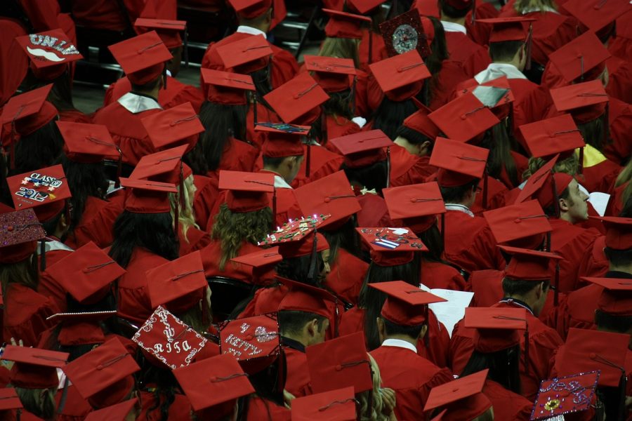 A change of tradition: Huntleys single-colored graduation gowns cause controversy