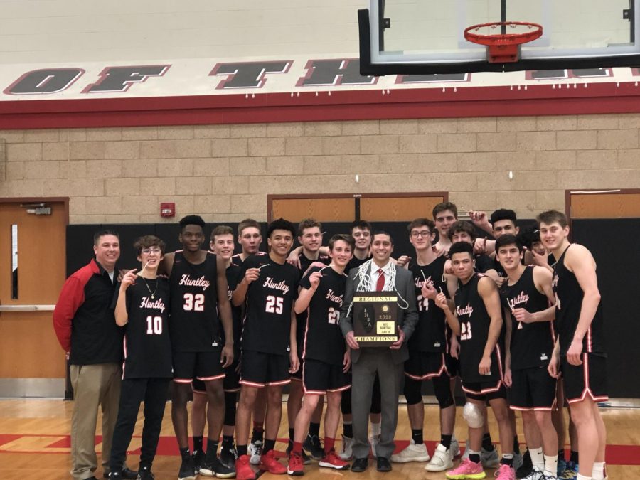 Raiders soar over the J-Hawks at varsity boys basketball regional finals