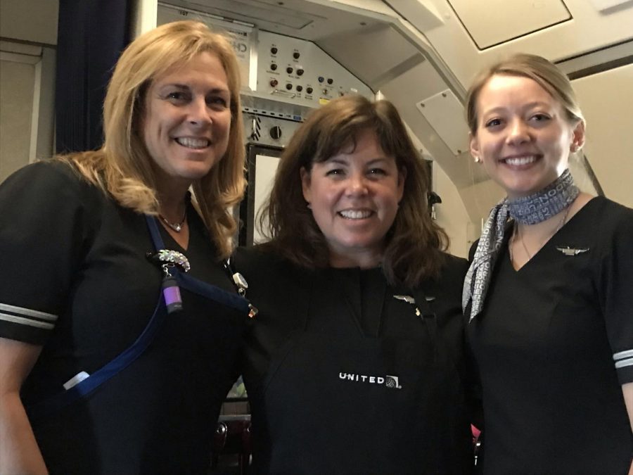 Kimberly with fellow flight attendants before COVID-19