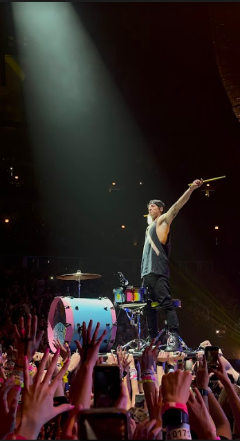 Drummer Josh Dun hypes up the crowd at their Takeover Tour in the United Center (Courtesy of P. DeSimone)