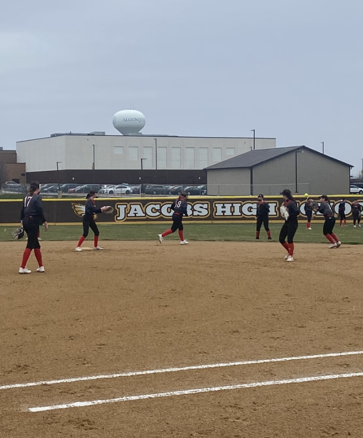 The team warming up before they start their game against Jacobs.