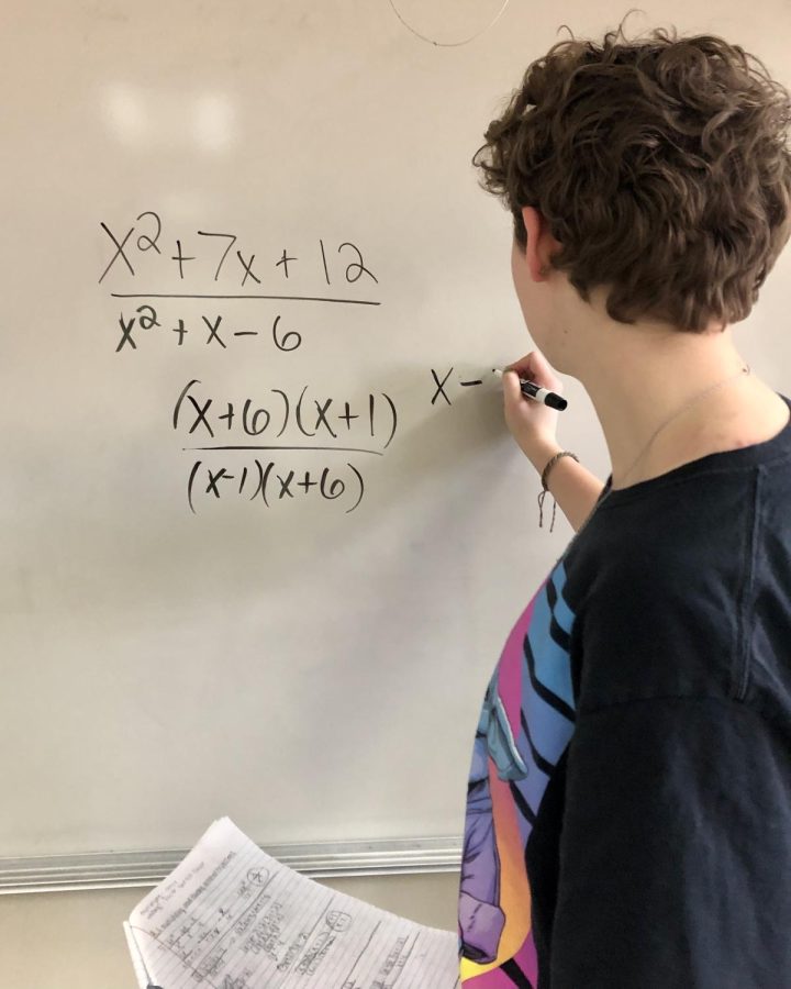 A high school student works on a math problem in Raider Aid.