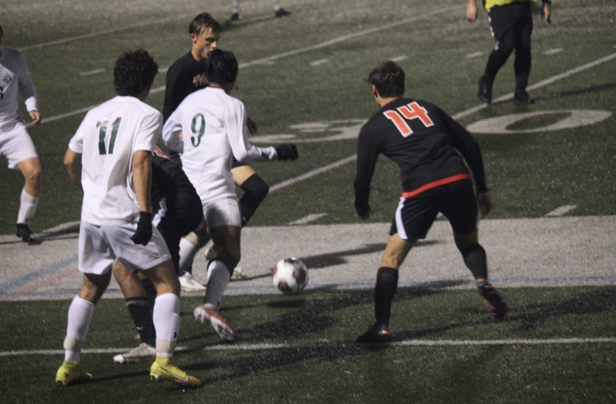 (D. Doyle) Raider player dribbling the soccer ball towards the opponent’s side.