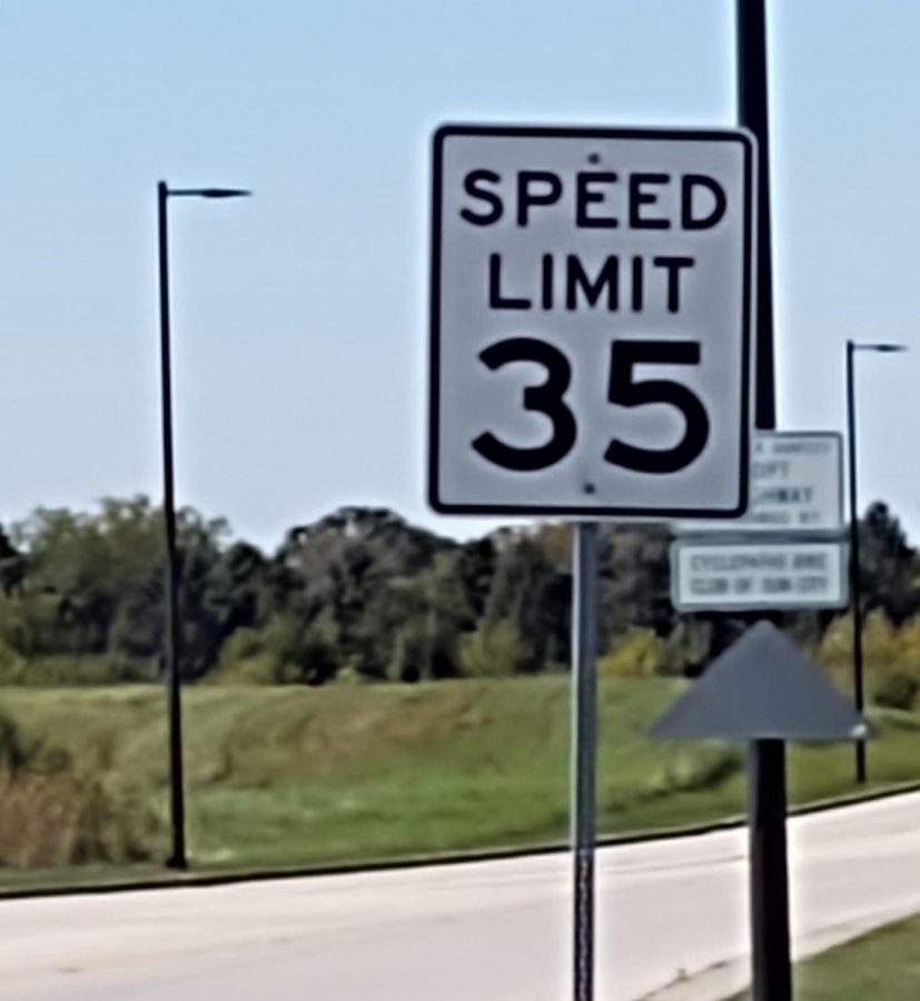 One of many signs along Del Webb Boulevard that display the maximum speed limit of 35.