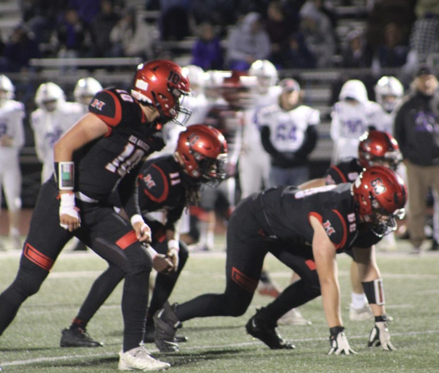 Huntley players prepare for their next play. (G. Edelstein)
