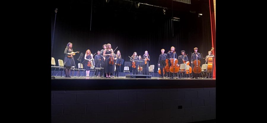 The Symphonic Orchestra taking a final stand after performing Turtlewood Stamp.
