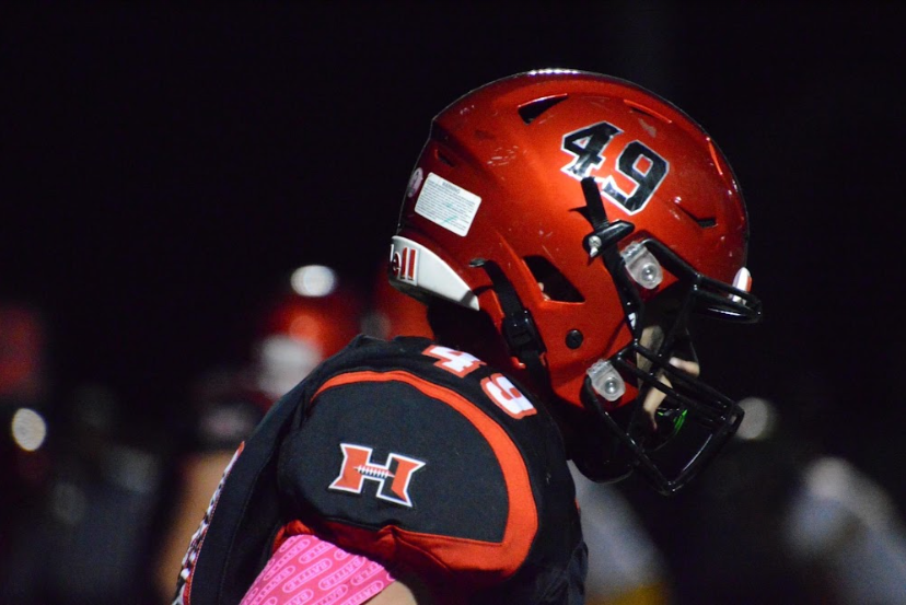 Sophomore Ari Fiebig preparing for a play at Huntley’s pink out game.