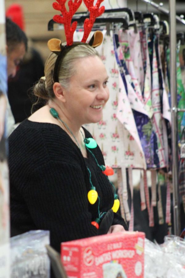 A fellow vendor at the craft fair enjoying their time and happy to be at the event.