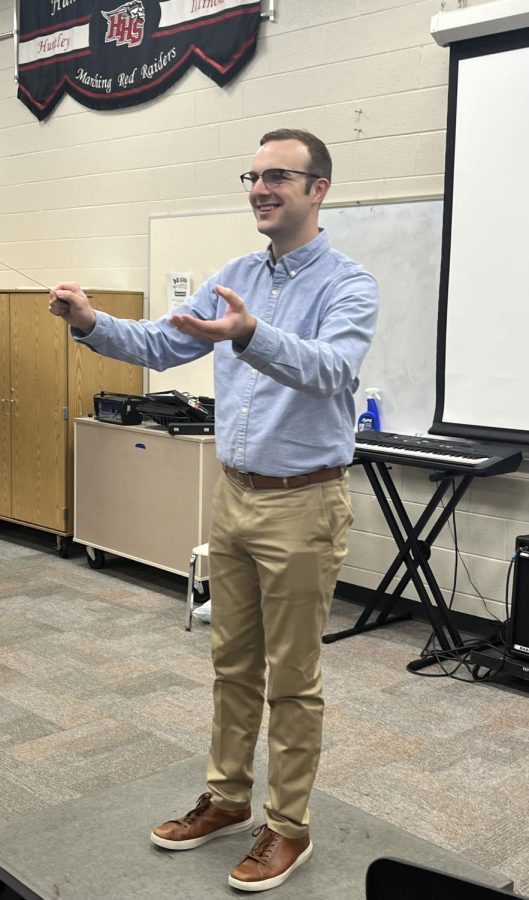 Krivosik is passionate in leading his students through conducting the band.