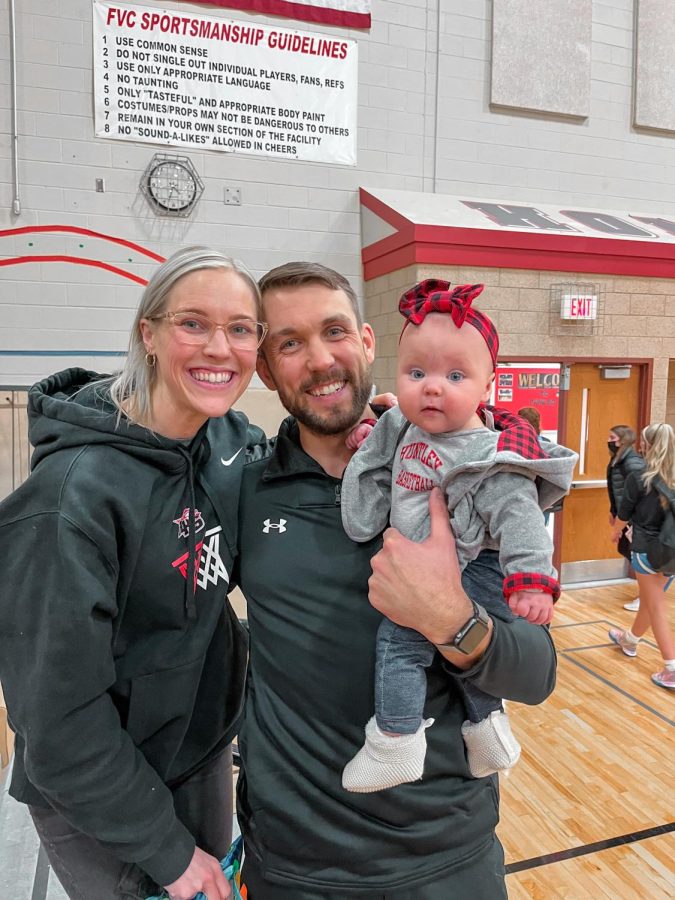 The Henricksen family comes to support the HHS basketball games. (E. McCoy)