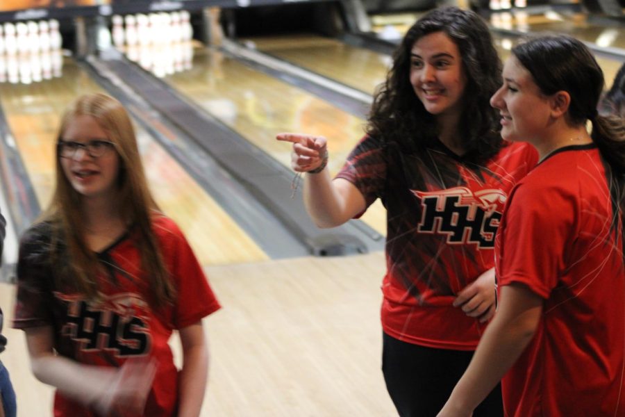 Huntley bowlers talking with each other.