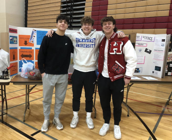 Alex Napientek, Connor Ardell, and Justin Jacobsen, the owners of BingBall, at the freshman assembly for business classes.