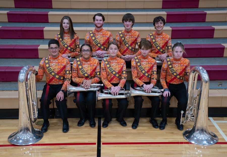 Santino Bedolla, top right, in uniform sitting with his euphonium and in uniform. 