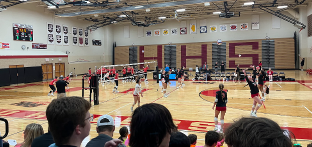 Huntley girls varsity volleyball team plays against Barrington