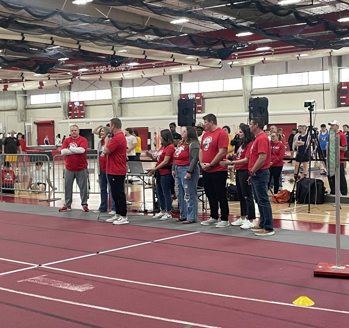 Casey Popenfoose stands amongst his family and gives a passionate speech about his late father, Joel Popenfoose, a previous coach of HHS track and field.
