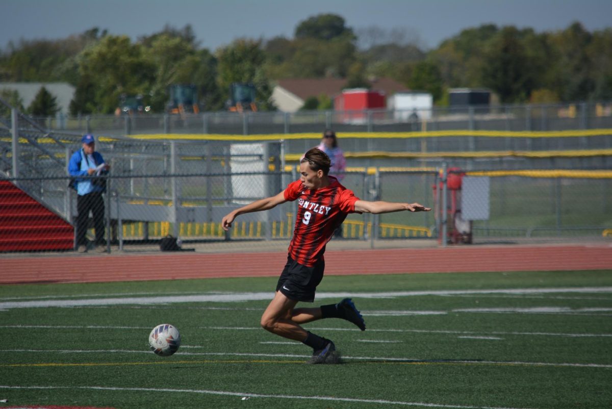 Anthony Freelas preparing to kick the ball. 