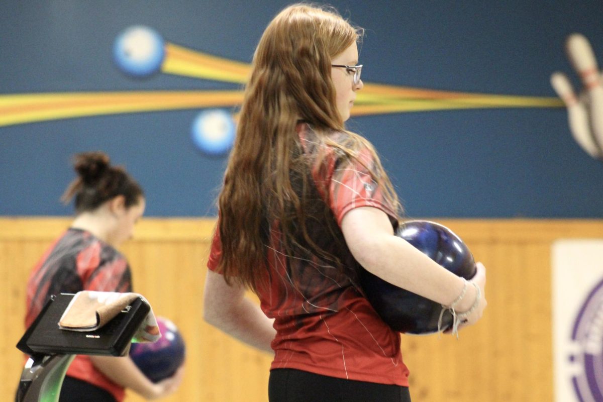 Mackenzie Miller getting ready to bowl after her opponent.