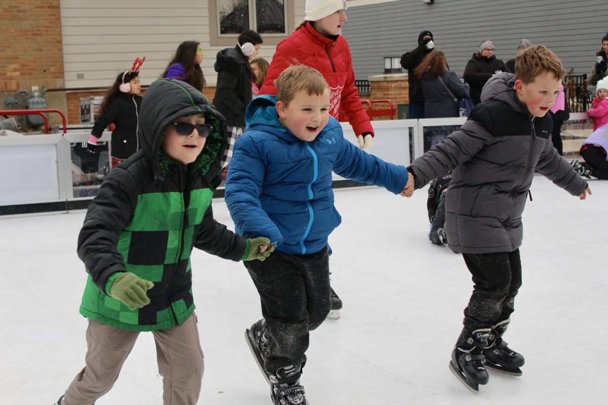 Children holding hands as they glide through the ice moments before they fell.