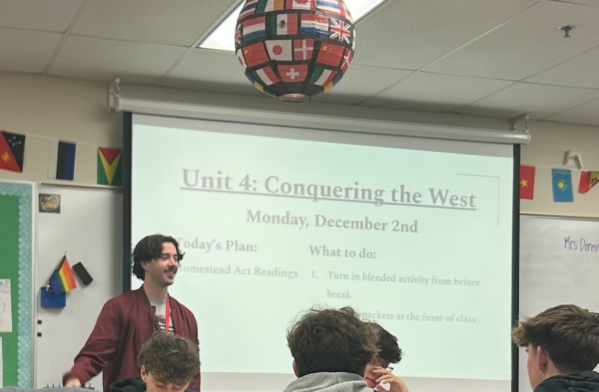 David Lewis starting a lesson on the unit four topic: conquering the west. 