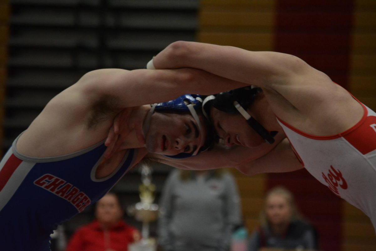 Senior Vladimir grappling with his opponent and trying to take control.