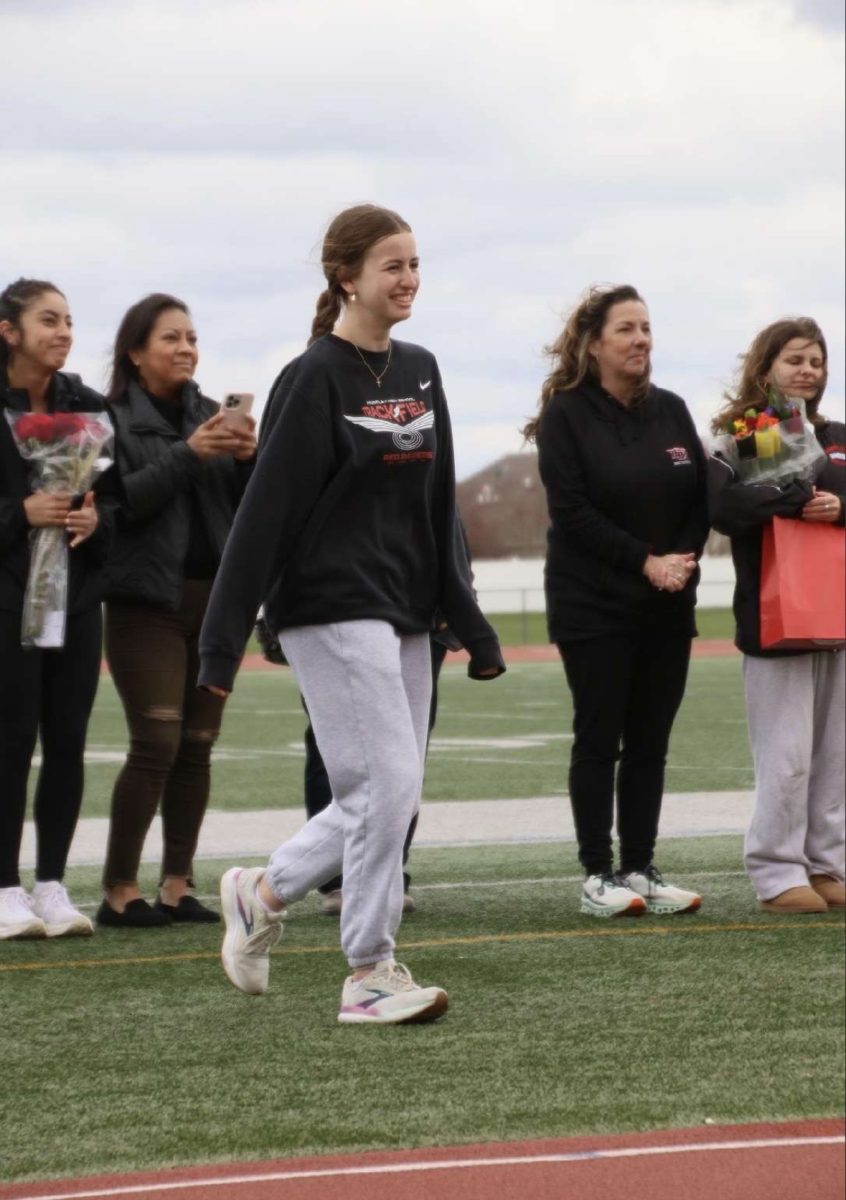 Senior Margaret Huber receiving her recognition.