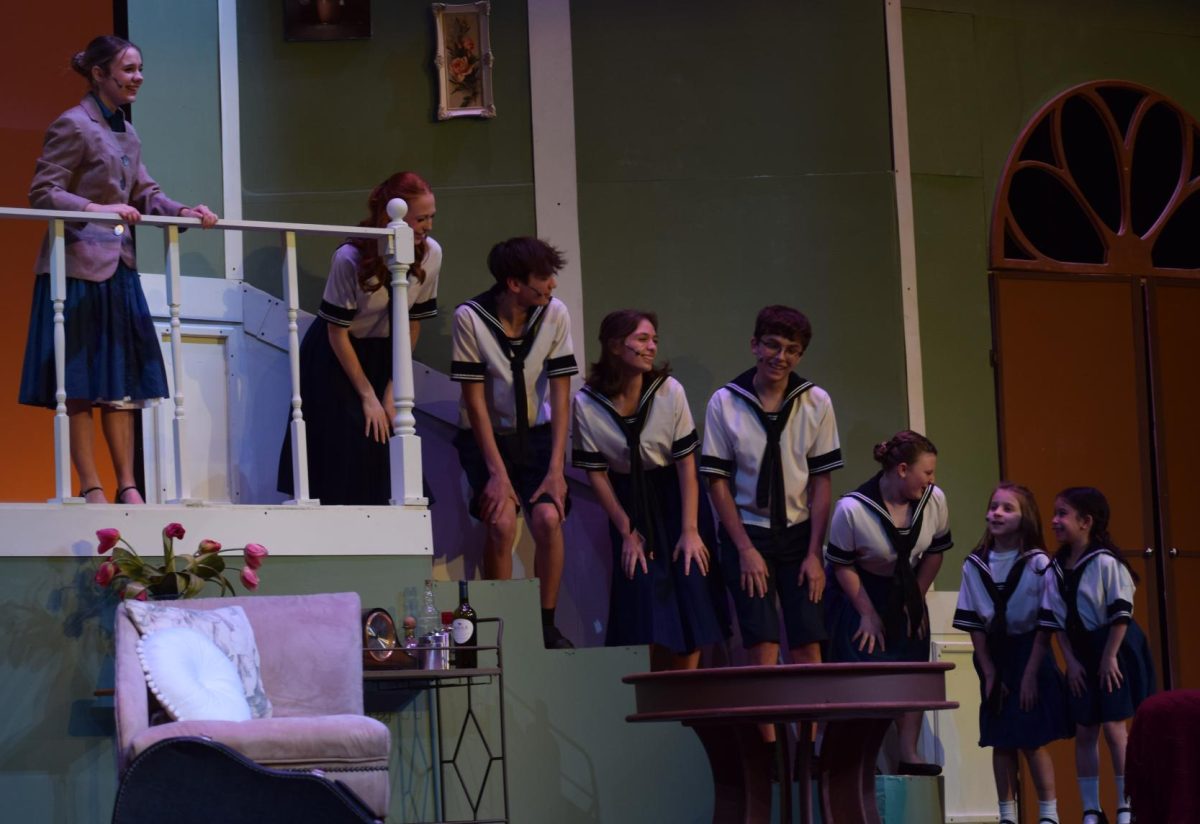 Maria and the Von Trapp children singing "Do-Re-Mi". 