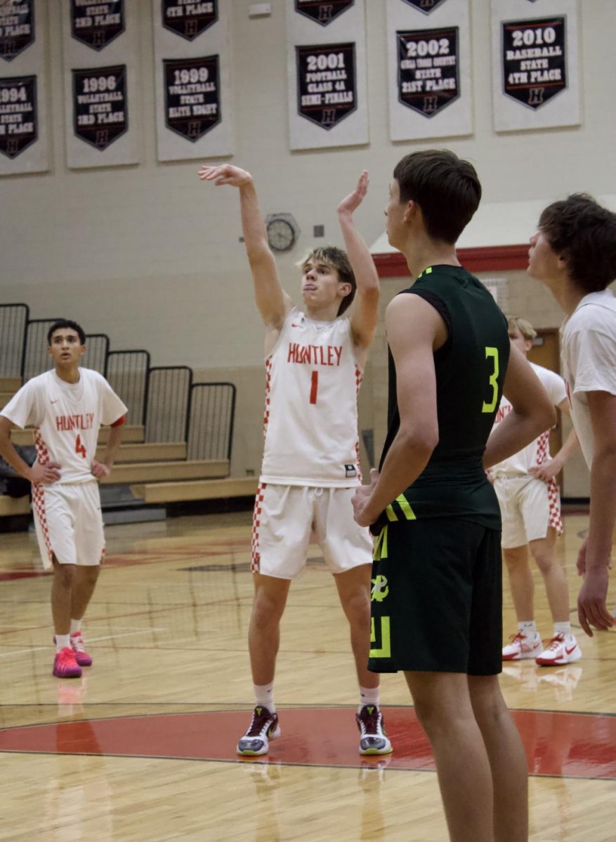 Number one, Nolan Jones, at the free throw line after shooting the ball.
