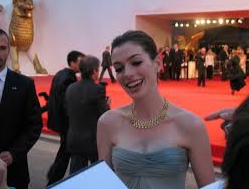 Actor Anne Hathaway featured as Andy Sachs
